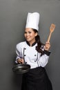 Female chef ready to cook Royalty Free Stock Photo