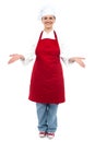 Female chef welcoming you with a smile Royalty Free Stock Photo
