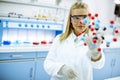 Female chemist hold molecular model in the lab Royalty Free Stock Photo