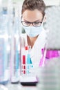 Female chemist making experiment Royalty Free Stock Photo