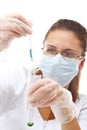 Female chemist using test tubes Royalty Free Stock Photo