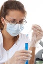Female chemist using test tubes Royalty Free Stock Photo