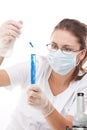 Female chemist using test tubes Royalty Free Stock Photo