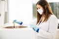 Female chemist working with a centrifuge Royalty Free Stock Photo