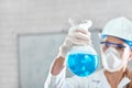 Female chemist working at the laboratory