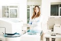 Female chemist working in a modern lab Royalty Free Stock Photo