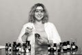 Female chemistry student with glassware test flask. Royalty Free Stock Photo