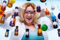 Female chemistry student with glassware test flask. Royalty Free Stock Photo