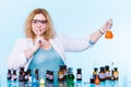 Female chemistry student with glassware test flask. Royalty Free Stock Photo