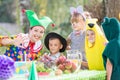 Female and children wearing costumes