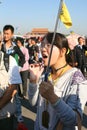 Female Chinese tour guide with microphone