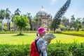 A female Chinese tourist in the Chhatrapati Shivaji Maharaj Vastu Sangrahalaya, formerly The Prince of Wales Museum, the main