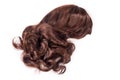 Female chocolate brown wig isolated on white background. Golden brown human hair weaves, extensions and wigs. Woman beauty concept