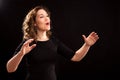 Female choir conductor Royalty Free Stock Photo