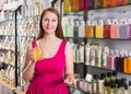 Female choosing sweet liquid soap