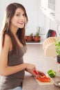 Female chopping food ingredients Royalty Free Stock Photo