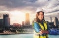 Female Civil engineer is standing in front of Japan Yokohama Skyscraper City for city development