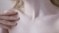 Female clavicles and neck. Action. Female clavicle. Perfect skin of a young woman close-up Royalty Free Stock Photo