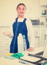 Female cleaner with duster Royalty Free Stock Photo