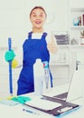 Female cleaner with duster Royalty Free Stock Photo