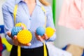 Female cleaner in laundry shop