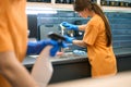 Female cleaners clean surfaces in the kitchen area Royalty Free Stock Photo