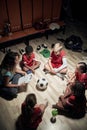 Female coach with a kid`s soccer team in a relaxed atmosphere talking about the game Royalty Free Stock Photo