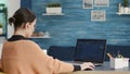 Female coder programming analytics report on technical interface Royalty Free Stock Photo