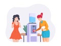 Female colleagues standing near water cooler and chatting Royalty Free Stock Photo