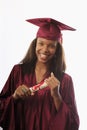 Female college graduate in cap and gown Royalty Free Stock Photo