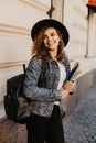 Female college student with books outdoors in the street. Smiling school girl with books standing at campus. Portrait of perfect Royalty Free Stock Photo