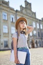 Female college or university student girl in hat and laptop Royalty Free Stock Photo