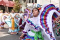Female in a colorful dress performing on a street during the Mexican Independence Day Parade Royalty Free Stock Photo