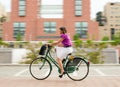 Female commuter cycling Royalty Free Stock Photo