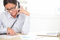Female company worker talking on the phone Royalty Free Stock Photo