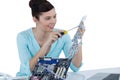 Female computer engineer repairing computer motherboard Royalty Free Stock Photo
