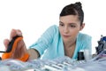 Female computer engineer repairing computer motherboard Royalty Free Stock Photo