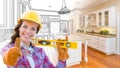 Female Construction Worker In Front of Custom Kitchen Drawing Royalty Free Stock Photo