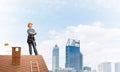 Female construction worker in hardhat standing Royalty Free Stock Photo