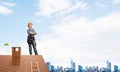 Female construction worker in hardhat standing Royalty Free Stock Photo