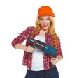 Female construction worker in a helmet with a perforator Royalty Free Stock Photo