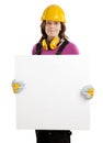 Female construction worker holder blank sign isolated on white. Royalty Free Stock Photo