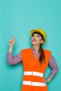 Female Construction Worker Looking Up And Pointing Royalty Free Stock Photo