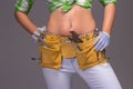 Female Construction Worker With Tool belt. Royalty Free Stock Photo