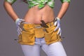 Female Construction Worker With Tool belt. Royalty Free Stock Photo