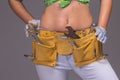 Female Construction Worker With Tool belt. Royalty Free Stock Photo