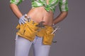 Female Construction Worker With Tool belt. Royalty Free Stock Photo