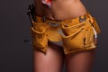 Female Construction Worker With Tool belt. Royalty Free Stock Photo