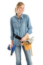 Female Construction Worker With Tool Belt And Drill Looking Away Royalty Free Stock Photo