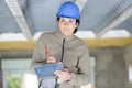 female contractor writing on clipboard Royalty Free Stock Photo